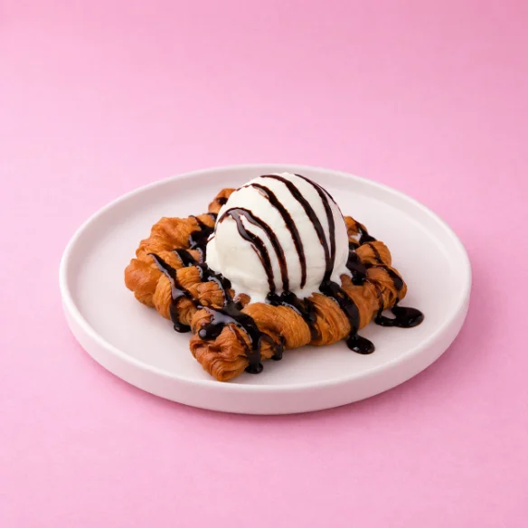 Ice cream croffle with chocolate drizzle