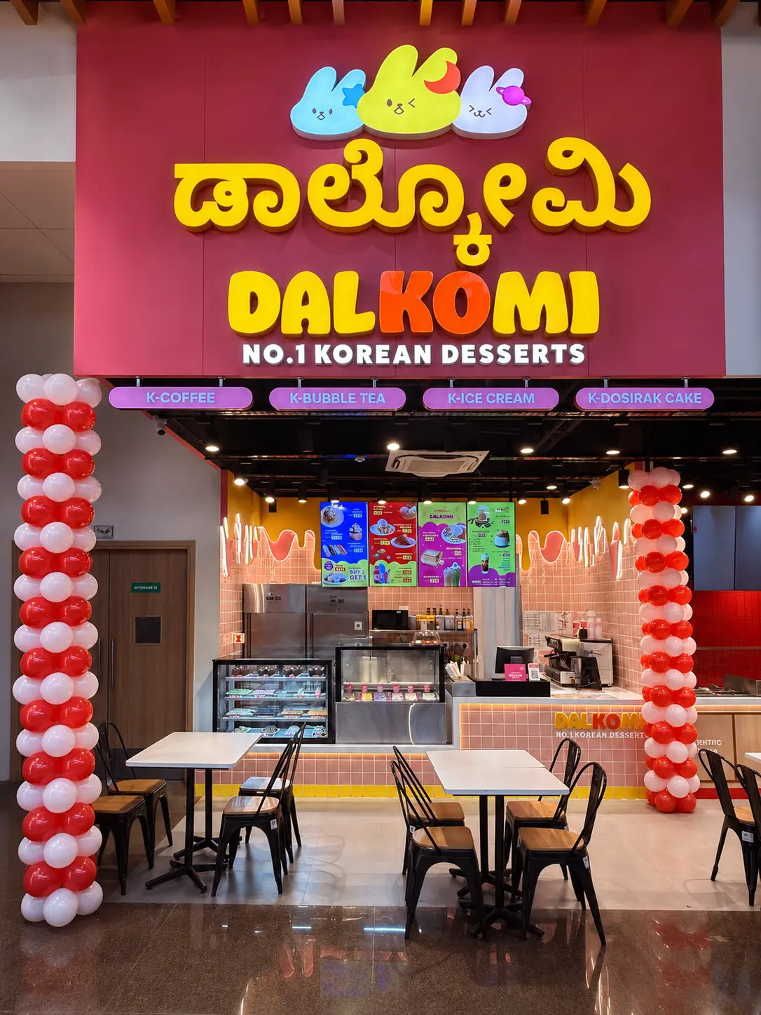 Dalkomi storefront at Orion Uptown Mall with opening balloons